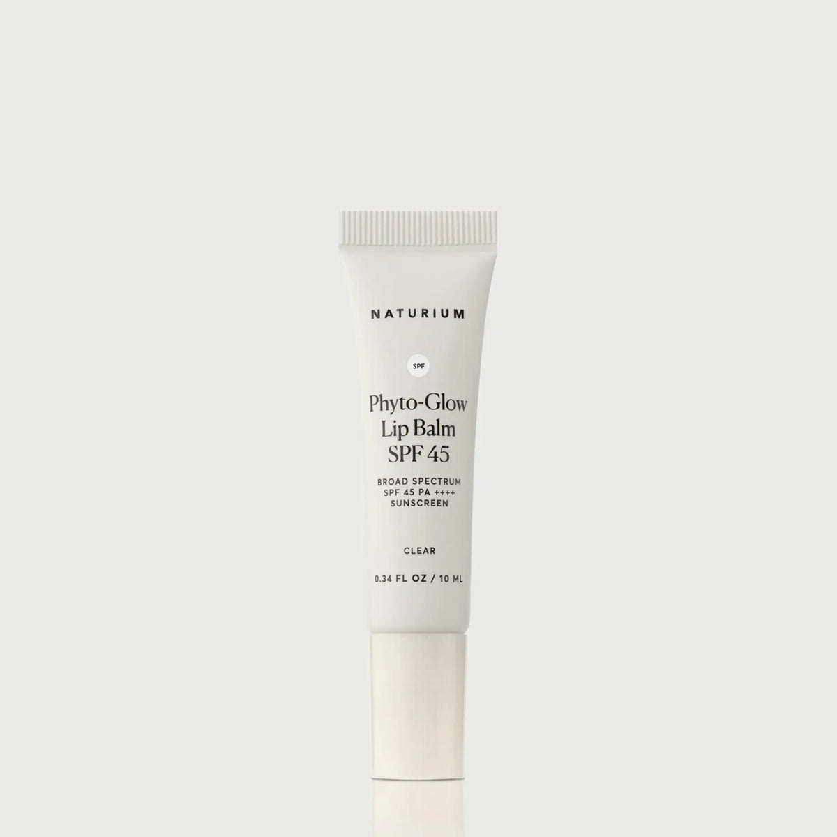 phyto-glow-lip-balm-spf-45-clear-z7 NATR-10124_PhytoGlow_SPF_Clear_primary_capon_front_bonebkgd_1.webp