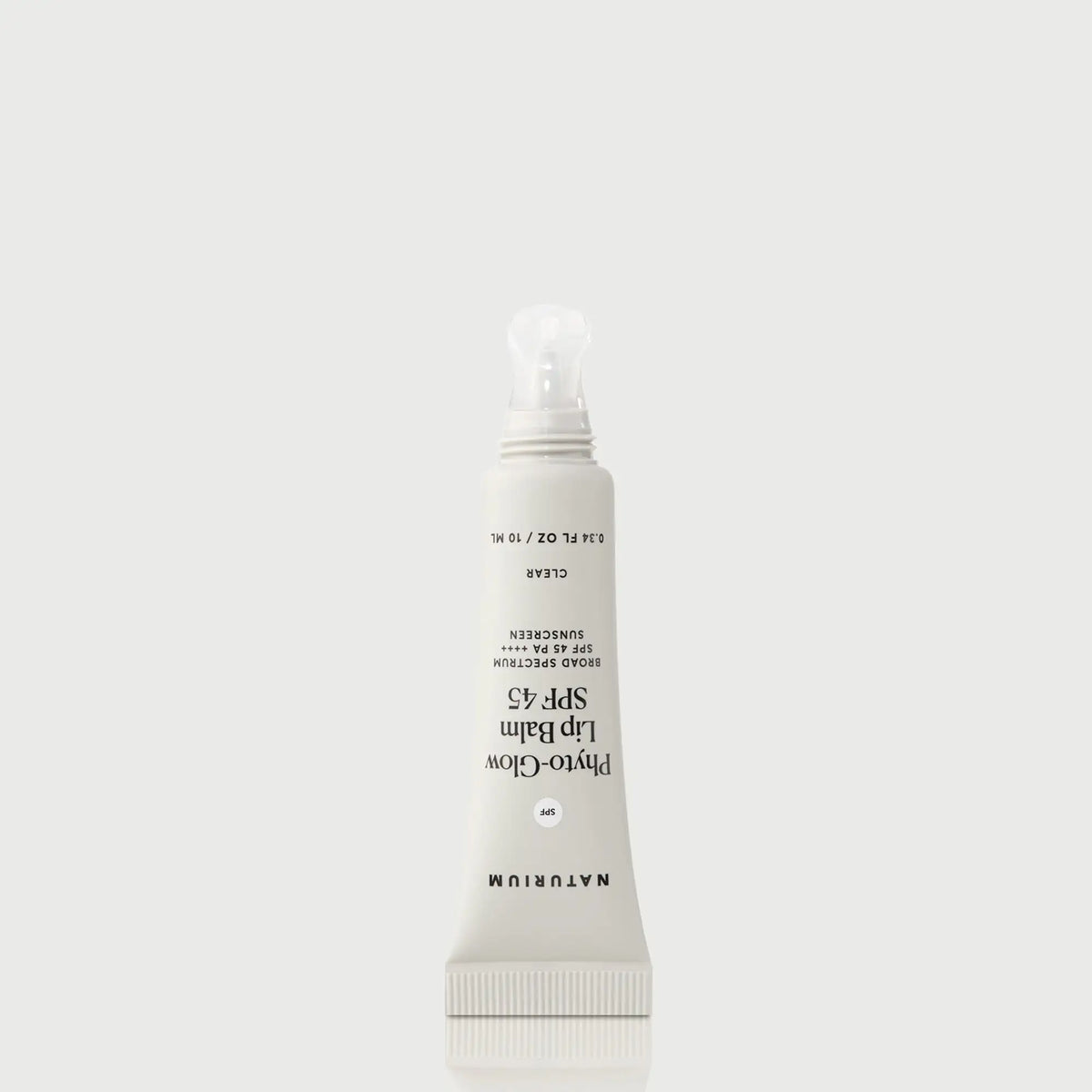 phyto-glow-lip-balm-spf-45-clear-z7 NATR-10124_PhytoGlow_SPF_Clear_primary_nocap_bonebkgd_1.webp