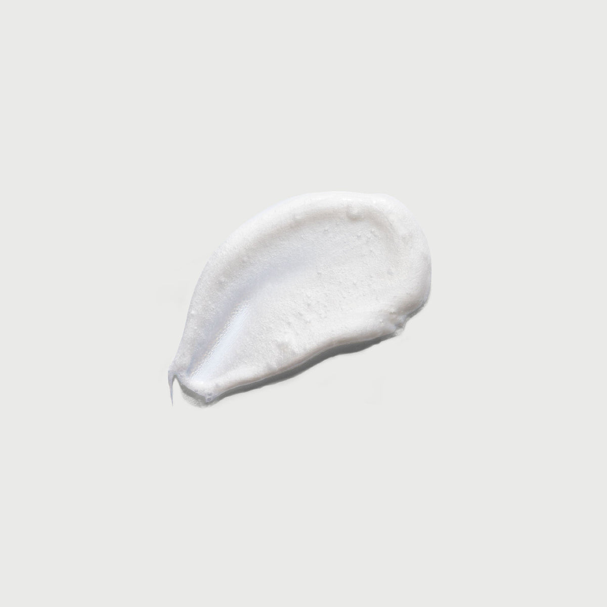 the-smoother-glycolic-acid-exfoliating-body-wash-n6 NATR-40002-Swatch-The-Smoother-Glycolic-Acid-Exfoliating-Body-Wash-bonebkgd.jpg