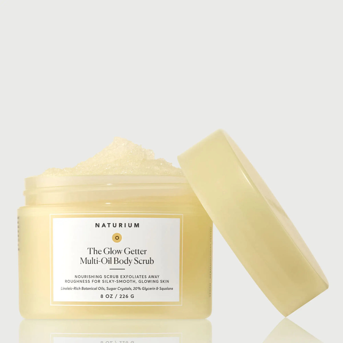 the-glow-getter-multi-oil-body-scrub-r7 NATR-40028-GlowGetter-Multi-Oil-Body-Scrub-Front-CapOff-bonebkgd.webp