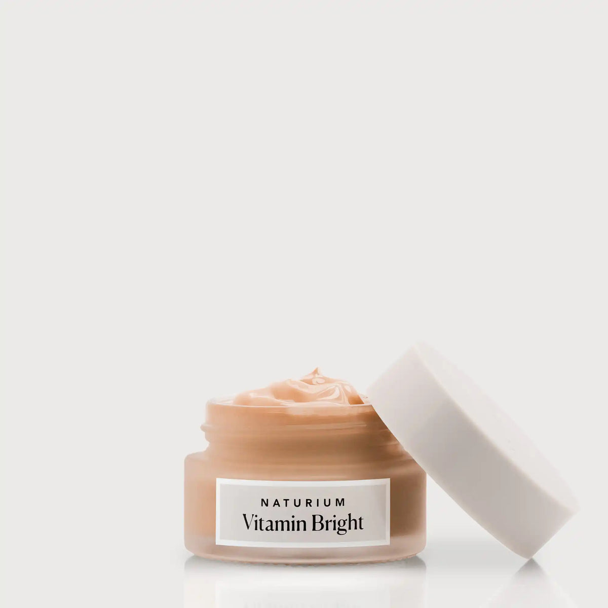 vitamin-bright-illuminating-eye-cream-p9 NATR-VitaminBright_DEEP_Primary_front_openjar_bone.webp