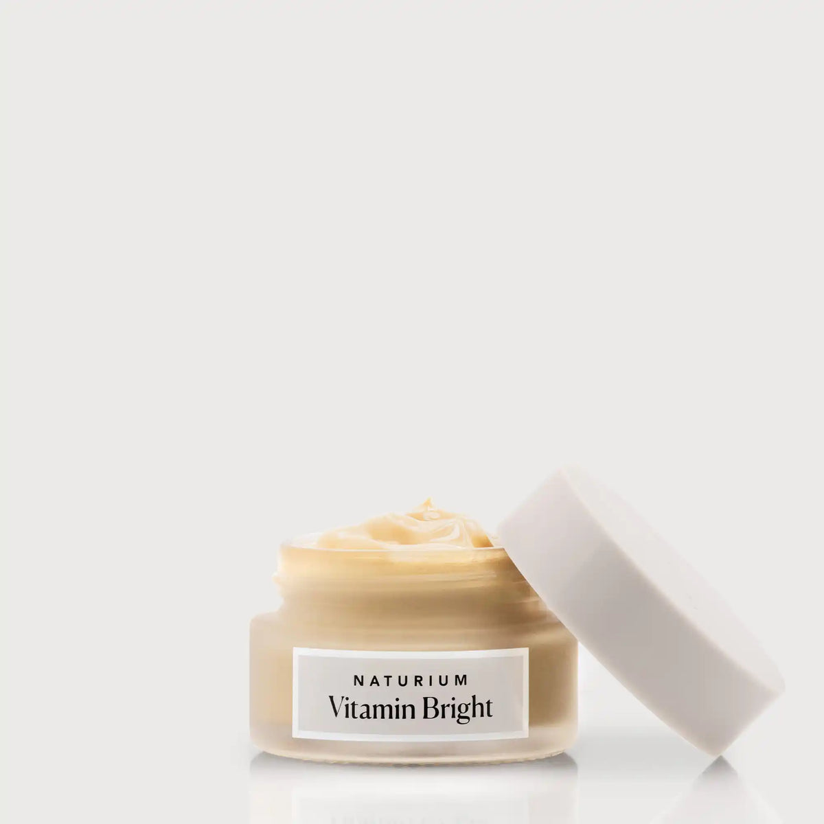 vitamin-bright-illuminating-eye-cream-p9 NATR-VitaminBright_LIGHT_Primary_front_openjar_bone.webp